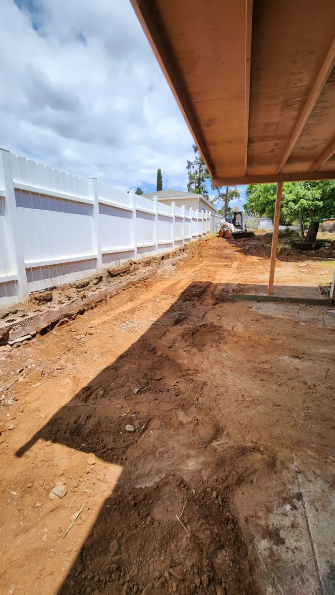 Rough grading and debris removal in progress